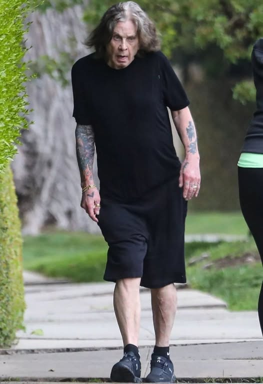 Rare Paparazzi Photo of Legendary Rock Star Spotted in Public!: Who Is He?