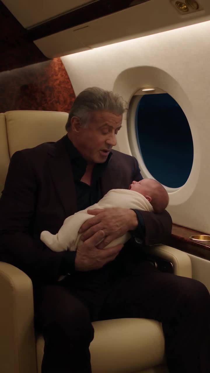 A Powerful Stranger Held a Crying Baby on a Flight, Then a Woman Saw His Hidden Heart