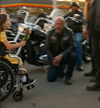 The Entire Biker Gang Fell Silent When a Little Girl in a Wheelchair Gave Their Leader Flowers… Then He Saw the Photo in His Pocket