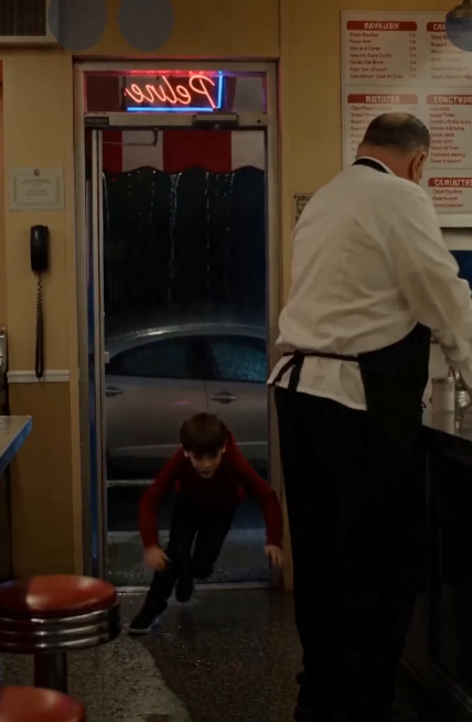 THE MAN CHASING THE LITTLE BOY WALKED INTO THE WRONG DINER… AND REALIZED TOO LATE WHO OWNED THE STREET