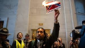 Justin Jones SET THE FLAG ON FIRE INSIDE THE STATE CAPITOL” — Justin Jones Sparks Explosive Backlash After Dramatic Protest in Tennessee
