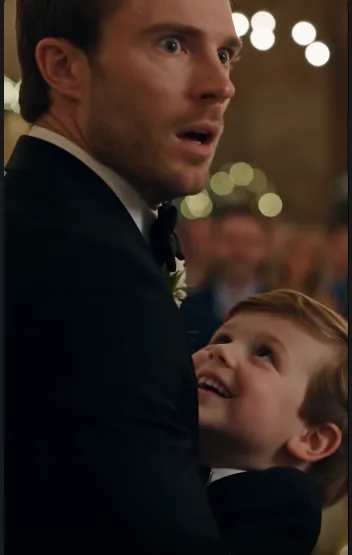 The little boy ran into the wedding and wrapped his arms around the groom.