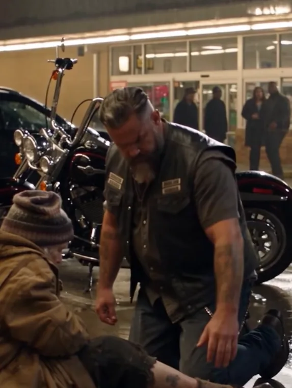 Biker Kneels Beside a Homeless Woman in the Rain — Then She Whispers a Name That Freezes Him Cold