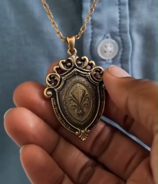 A BOY SAW A NECKLACE IN A HOTEL LOBBY.