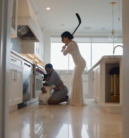 The heavy wooden hockey stick struck Grace across the shoulder before she could pull four-year-old Lily out of the way.