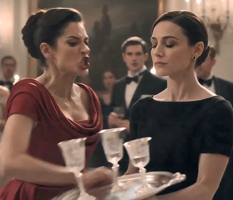 The ballroom remained frozen.  Elena slowly touched her bleeding lip, unable to comprehend what had just happened.  No one had ever struck her before.