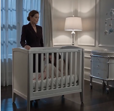 The moment Ethan Carter stepped into the nursery, the entire world seemed to stop.  His eyes locked onto the white crib in the center of the room.  Inside it sat Amelia.