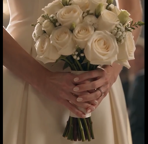 She stood there as a bride, facing the kind of moment that should have been soft, luminous, and unforgettable.