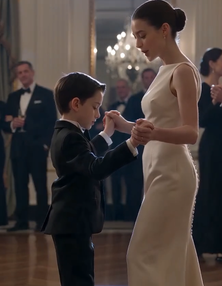 The ballroom at The Whitmore Hotel glittered like a carefully constructed lie.