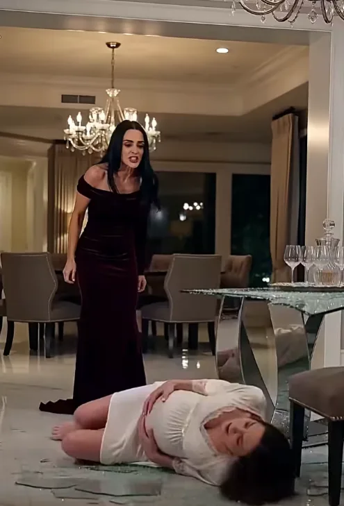 The heavy oak door of the suite creaked slightly, admitting a sharp draft that seemed to freeze the static air. Marcus Thorne did not move. His eyes remained locked on Isabella’s trembling lower lip, the theatrical tear that tracked down her powdered cheek, and then down to his wife, Khloe, curled protectively on the cold marble floor.