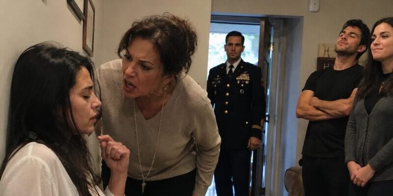 My Mother Hit Me So Hard I Crashed Into the Wall. My Sister-in-Law Spat at Me, and My Brother-in-Law Laughed and Called Me a Gold Digger, Thinking My Husband Was Still Overseas. But When the Front Door Opened and He Walked Into the Room, His Next Words Left Them Speechless with Horror.