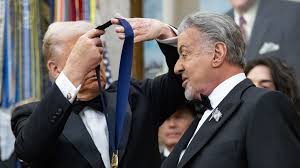 Trump Reached for a Hollywood Moment — But Stallone’s Cane Stole the Spotlight