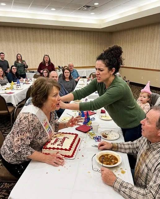 At my 2-year-old daughter’s birthday banquet, my mother-in-law slapped her across the face and sneered, “That defective little girl should never have been born into my family,” while my spineless husband sat there protecting his mother instead of his own child—so I sent his glasses flying into his stew, shoved his mother straight into the birthday cake, grabbed my terrified daughter, and walked out without telling any of them that one guest had captured something on her phone that could destroy their entire family.