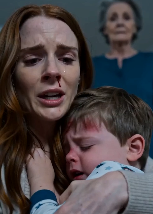 Maya sat on the floor, holding our feverish three-year-old against her chest. A thin line of blood ran from her nose while Oliver fought for each breath.