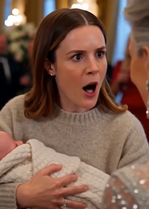 Victoria handed me a white gift box while I held my one-month-old daughter against my chest.