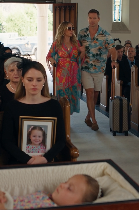 The funeral doors opened while the priest was still speaking.