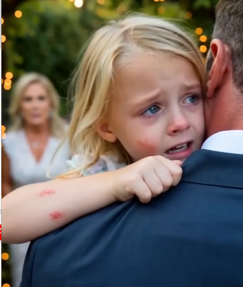I carried my sobbing four-year-old daughter into the crowded yard with one arm locked around her trembling body.