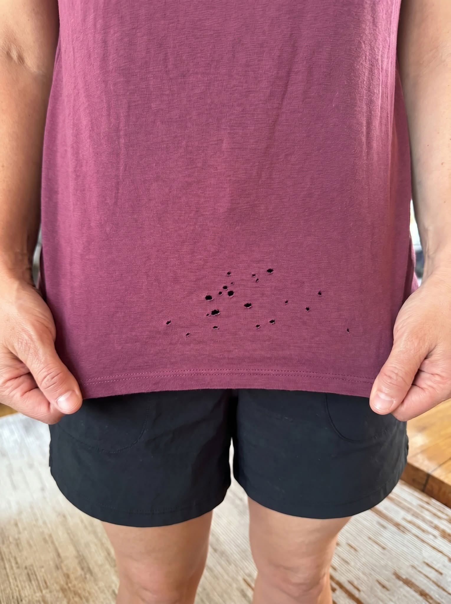 Small holes in a T-shirt: why they always appear in the same place