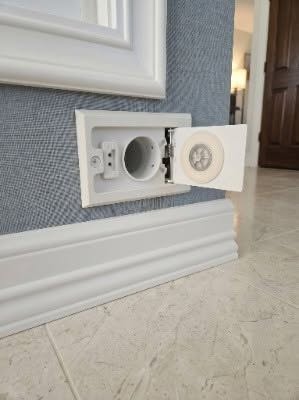 What is this strange electrical outlet near the floor? The surprising explanation.
