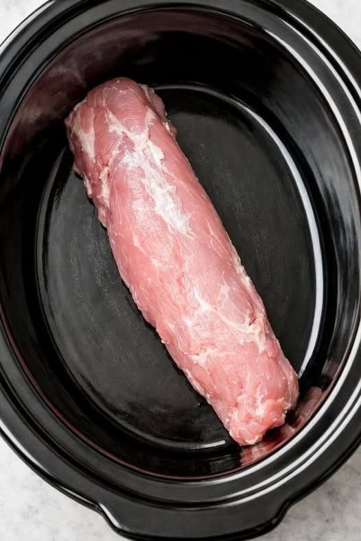 Dump a whole pork tenderloin in the slow cooker with 3 simple ingredients and your husband will swear you spent all day cooking.