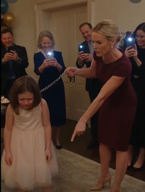 "The silver dog chain hit the marble floor beneath the chandeliers, and eight-year-old Lily stood frozen while dozens of well-dressed guests pointed their phones at her. Her stepmother, Vanessa, had just humiliated her in front of everyone, while Vanessa’s mother laughed from beside the fireplace and recorded every second.