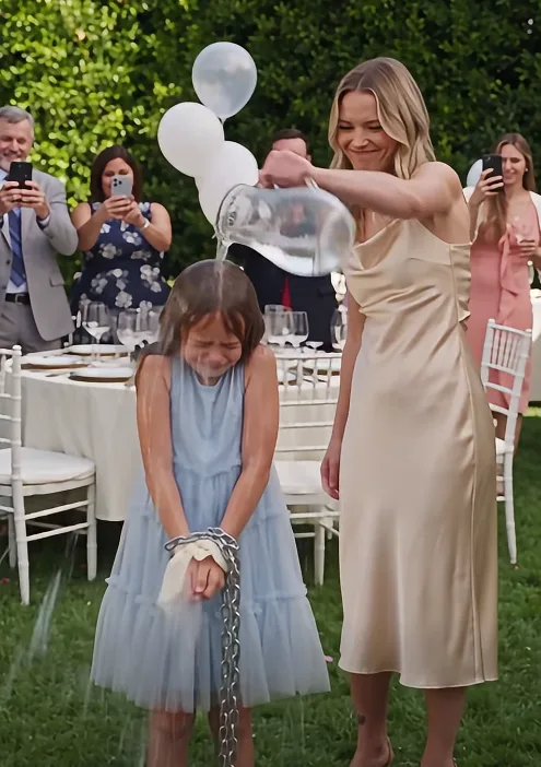 His wife chained his 8-year-old daughter in a soaking-wet dress and turned her humiliation into backyard entertainment