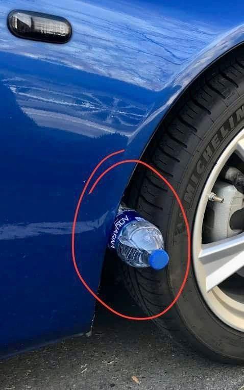Why You Should Pay Attention If You Notice a Plastic Bottle Near Your Car Tire