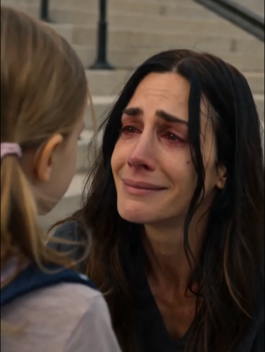 She walked out of the courthouse with three kids and no answers. He got his answers six blocks away.