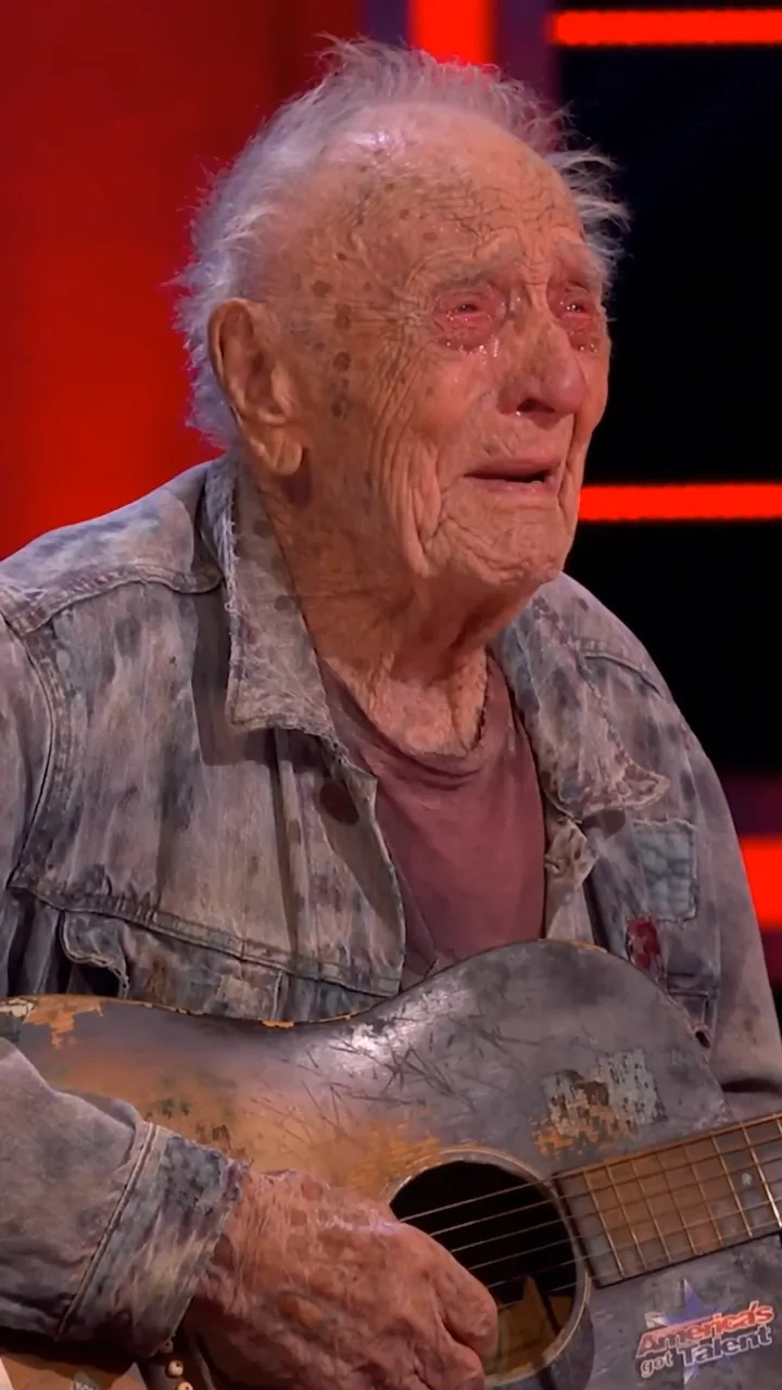 Full: D. THE JUDGE LAUGHED AT THE FRAIL OLD MAN. THEN HE SAW THE GUITAR IN HIS HANDS.