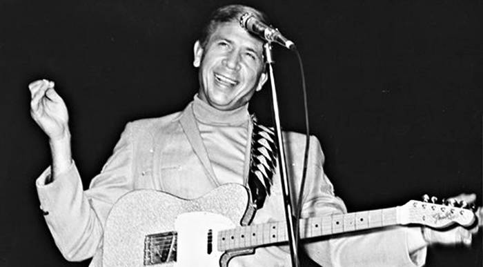 Buck Owens’ Spirited Performance in “Act Naturally”