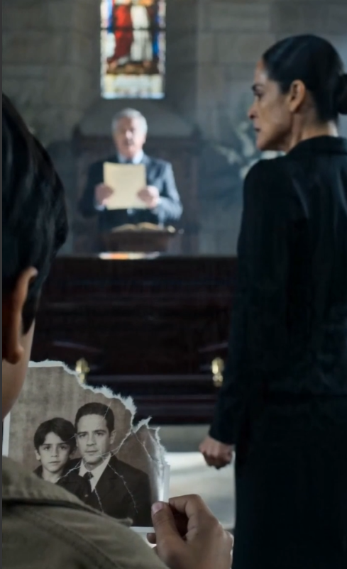 The Boy Beside the Closed Casket