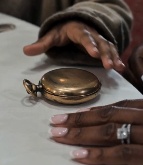 The Locket She Set Between Them
