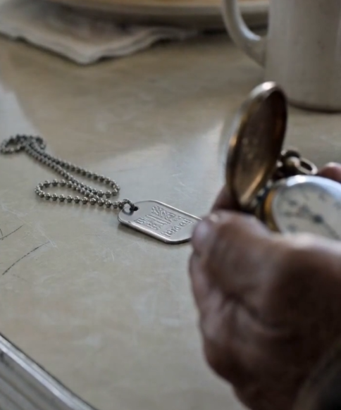 The Dog Tag Avery Slid Across the Table