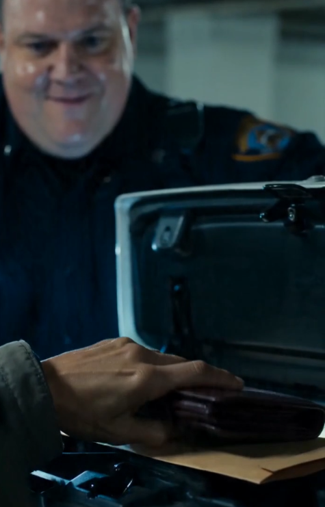 The Black Pouch in the Glove Box