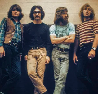 CCR Were at the Top of the World — John Fogerty Wrote This Song While Watching Them Fall Apart