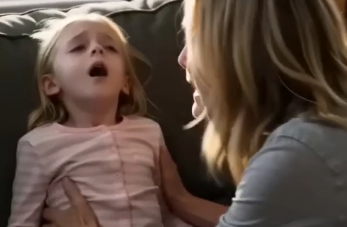 After coming home from my trip, I found my five-year-old fighting for every breath. My husband stood a few feet away, smiling like nothing was wrong. "She needed to be taught a lesson," he said with a shrug. My hands went numb as I called for an ambulance. The paramedics rushed in — and the second one of them looked at him, the whole room changed. Then he pulled me aside and whispered, "Your husband is..."