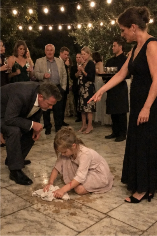 The Socialite Forced a Little Girl to Kneel and Clean the Floor at Her Own Garden Party — “She’s Nothing but a Charity Case,” She Smiled, But the Moment a Quiet Billionaire Noticed the Mark on Her Wrist and Asked Her Name, the Entire Room Realized the Child She Tried to Hide Was the One Person He Had Been Searching for All Along