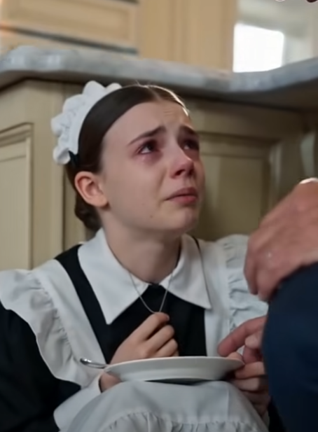 "No one in the mansion was supposed to see her like that. The kitchen was too beautiful for hunger. Cream cabinets gleamed under soft daylight. A crystal chandelier sparkled above the marble island. Expensive plates sat untouched on polished counters. Everything in the room looked clean, perfect, and rich.