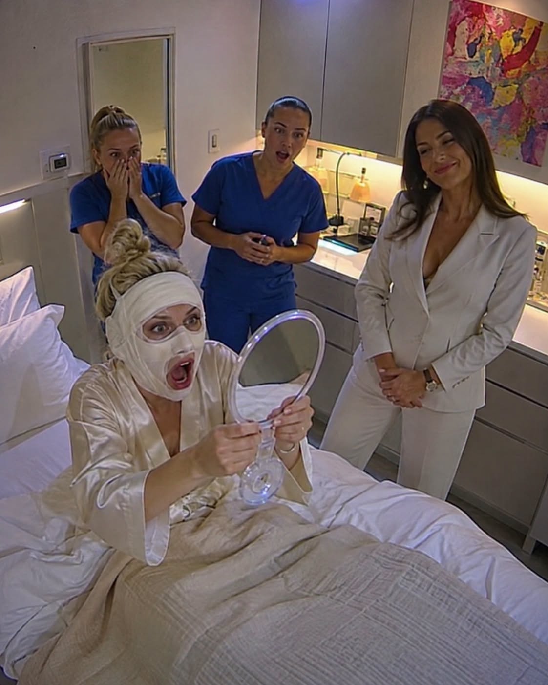 I never told my husband's mistress that I was the renowned plastic surgeon she booked a consultation with. She didn't recognize me in my mask and scrubs. She pointed to a photo of me on her phone and said, "I want to look better than this hag my boyfriend is married to. Make me younger so he finally dumps her." I simply smiled behind my mask and nodded. The surgery was a masterpiece. She believed she was waking up with a face that would make me weep with envy. But when the final bandage was peeled away, her face went pale.