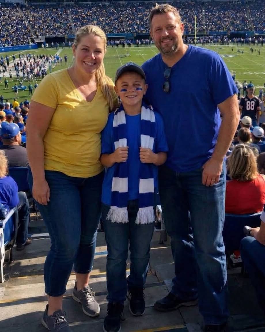 I took my terminally ill 10-year-old son to a football game as his final wish — then we appeared on the stadium's big screen, and the announcer said, ""There's something you don't know about this trip.""