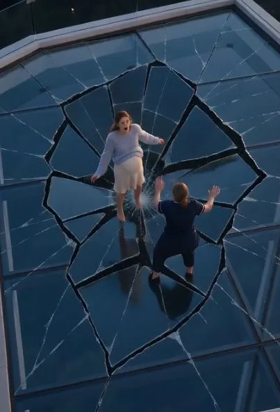 The glass roof was breaking beneath