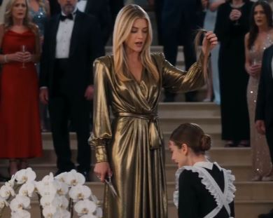 THE WOMAN BENEATH THE GOLDEN GOWN