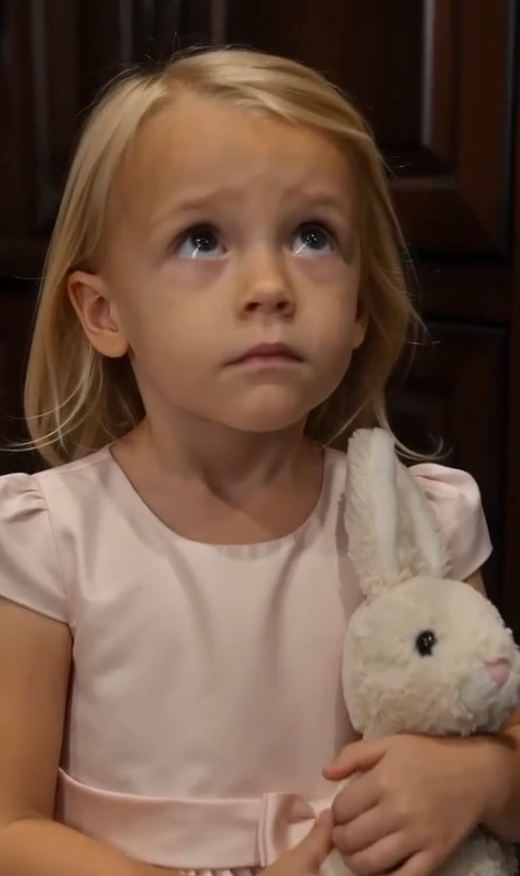 THE LITTLE DOOR BEHIND THE BLUE DRESSES