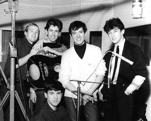 1966 — Graham Gouldman Wrote a Romance Around an Umbrella at a Bus Stop. How Did One Guitar Figure Carry The Hollies Into America’s Top 10?