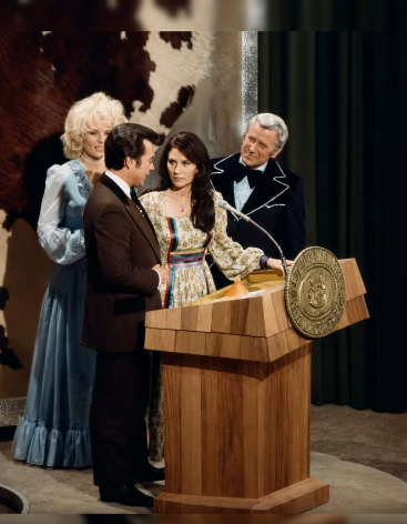 AT THE 1976 ACM AWARDS — Loretta Lynn Leaned Toward Conway Twitty And Whispered Something No One Was Supposed To Hear.
