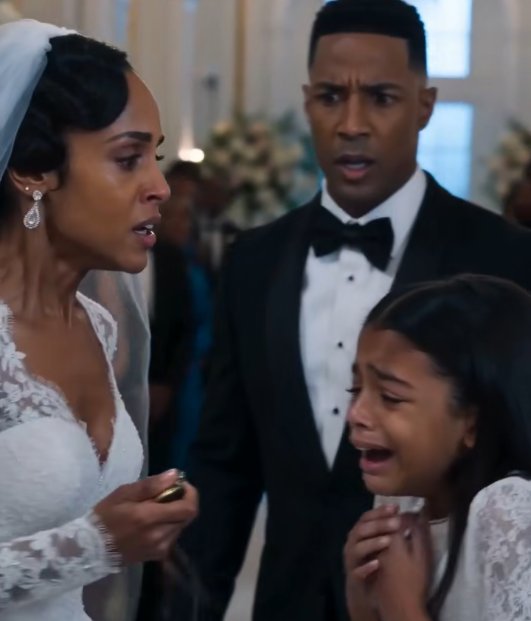 The bride was already tugging the gold locket from the little girl's neck when the groom rushed in.