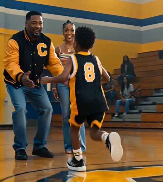 The basketball court was filled with cheers, but eight-year-old Marcus only cared about sharing his excitement.