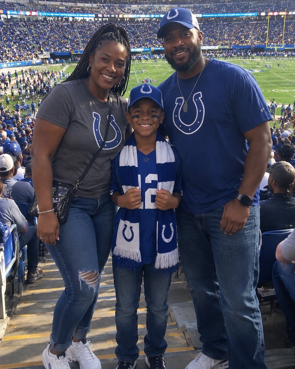 I took my terminally ill 10-year-old son to a football game as his final wish — then we appeared on the stadium's big screen, and the announcer said, "There's something you don't know about this trip."