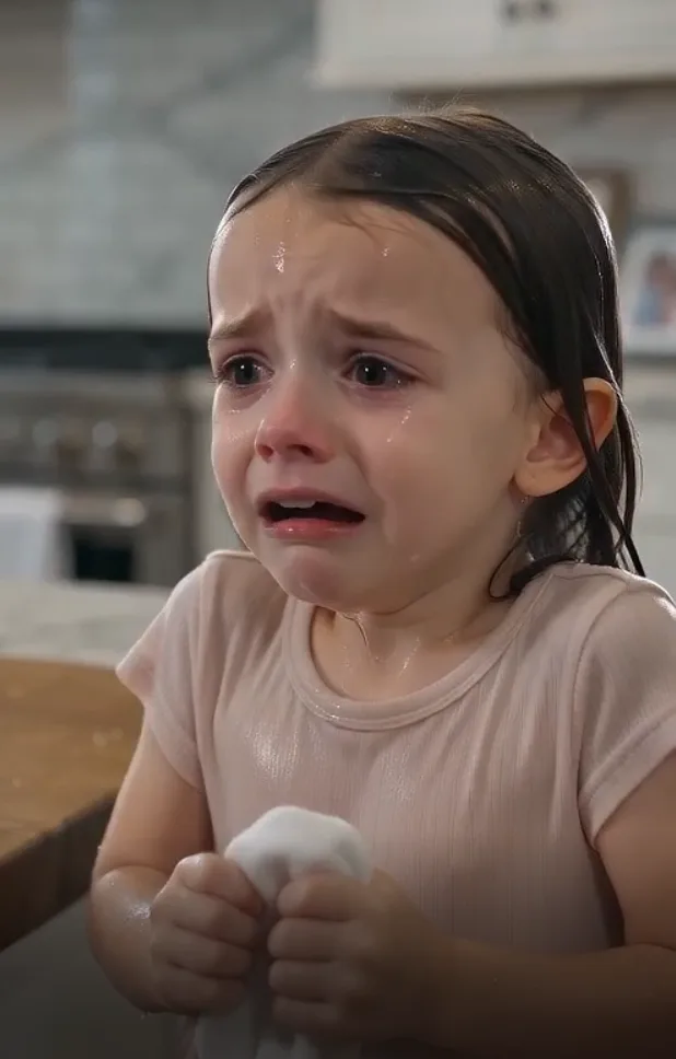 My three-year-old daughter was standing in our kitchen clutching one tiny white sock when my new wife dumped a bowl of ice water over her head and demanded, “Now call me Mom.” Lily sobbed that Vanessa was not her mother, and when I rushed in, my wife calmly told me the child simply refused to respect her. I almost believed the argument was about grief and discipline—until Lily pointed at Vanessa and whispered, “No, Dad… she’s lying.” What I found inside that little sock led me to a forged adoption petition, a hidden guardianship plan, and proof that Vanessa had been trying to erase my late wife from our daughter’s life for months because Lily’s inheritance was worth far more than I had ever told her.