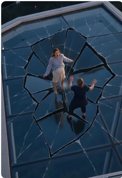 "The glass roof was breaking beneath his pregnant wife when Daniel finally reached the rescue door.